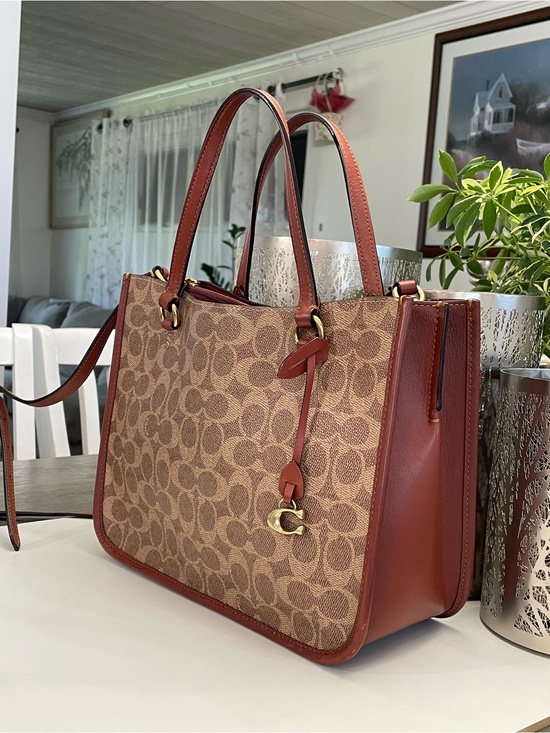 Coach Handbags - Coach Brown Signature Canvas Tote with Saddle Leather Trim